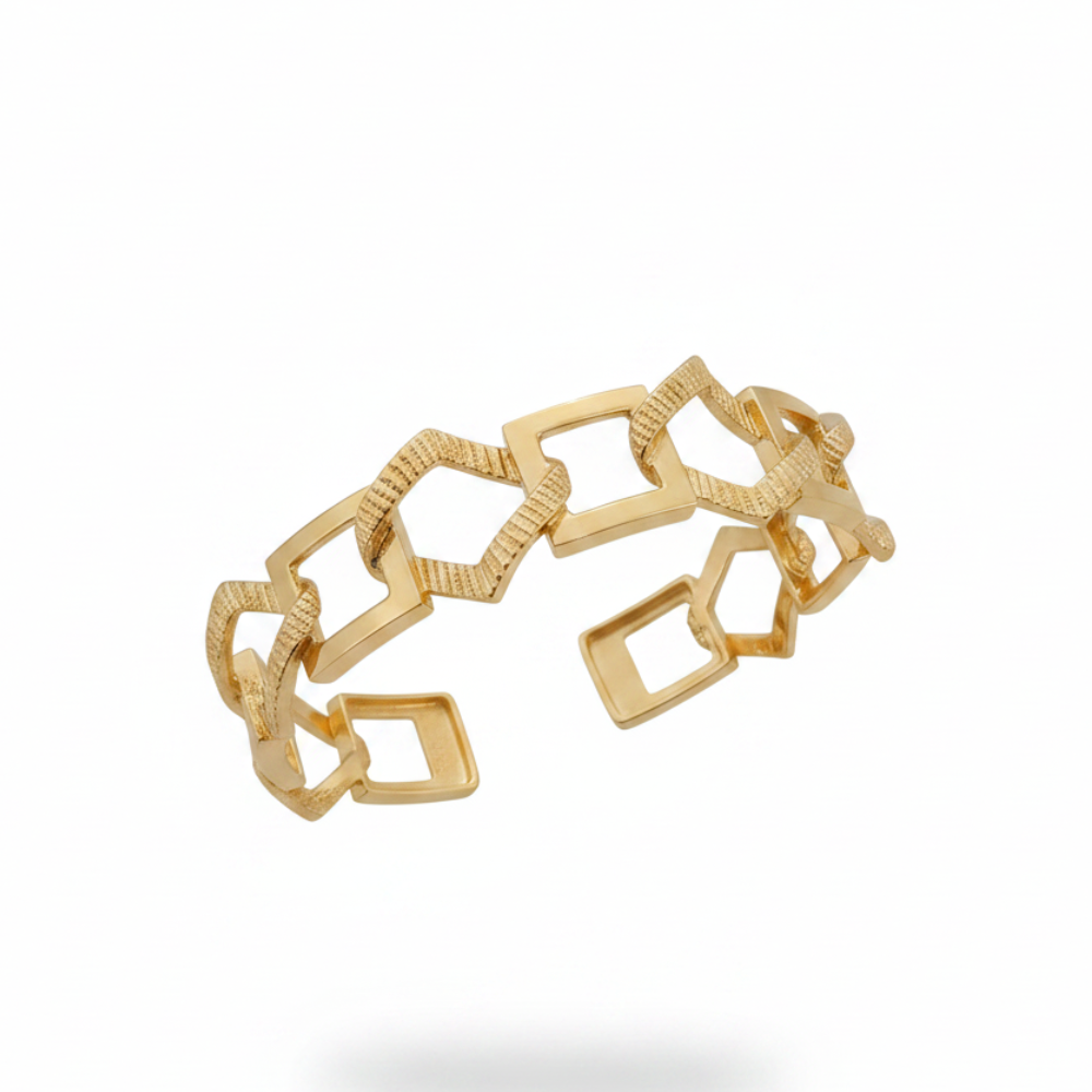 Gold geometric chain cuff bracelet worn on wrist
