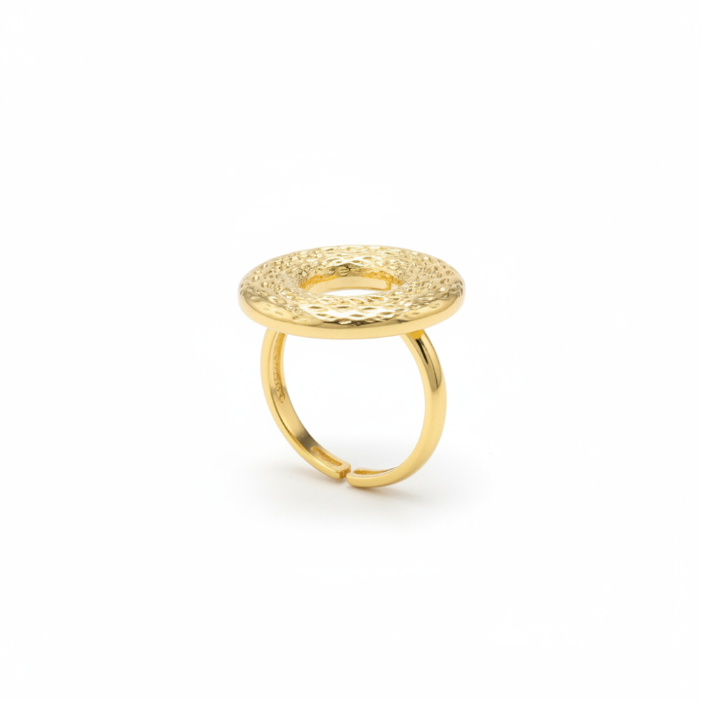 Gold open circle adjustable ring with hammered dome on white background