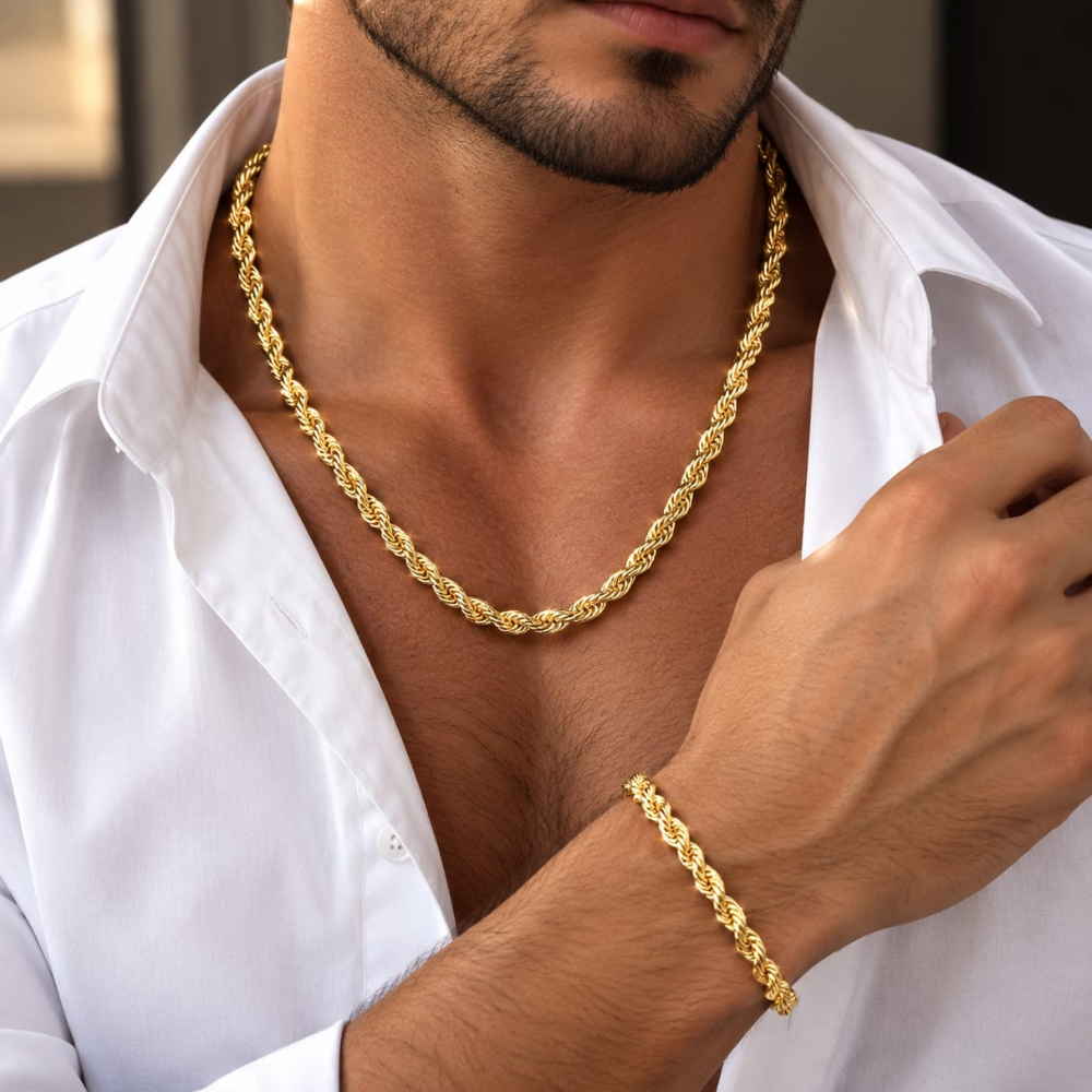 Gold-tone rope chain necklace and matching bracelet on a white background