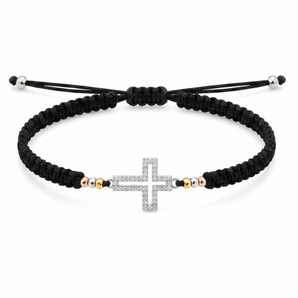 Silver cross bracelet flat lay on white background