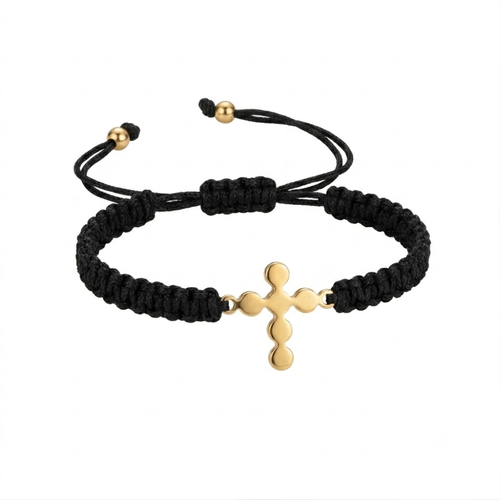 Gold budded cross bracelet flat lay on white background