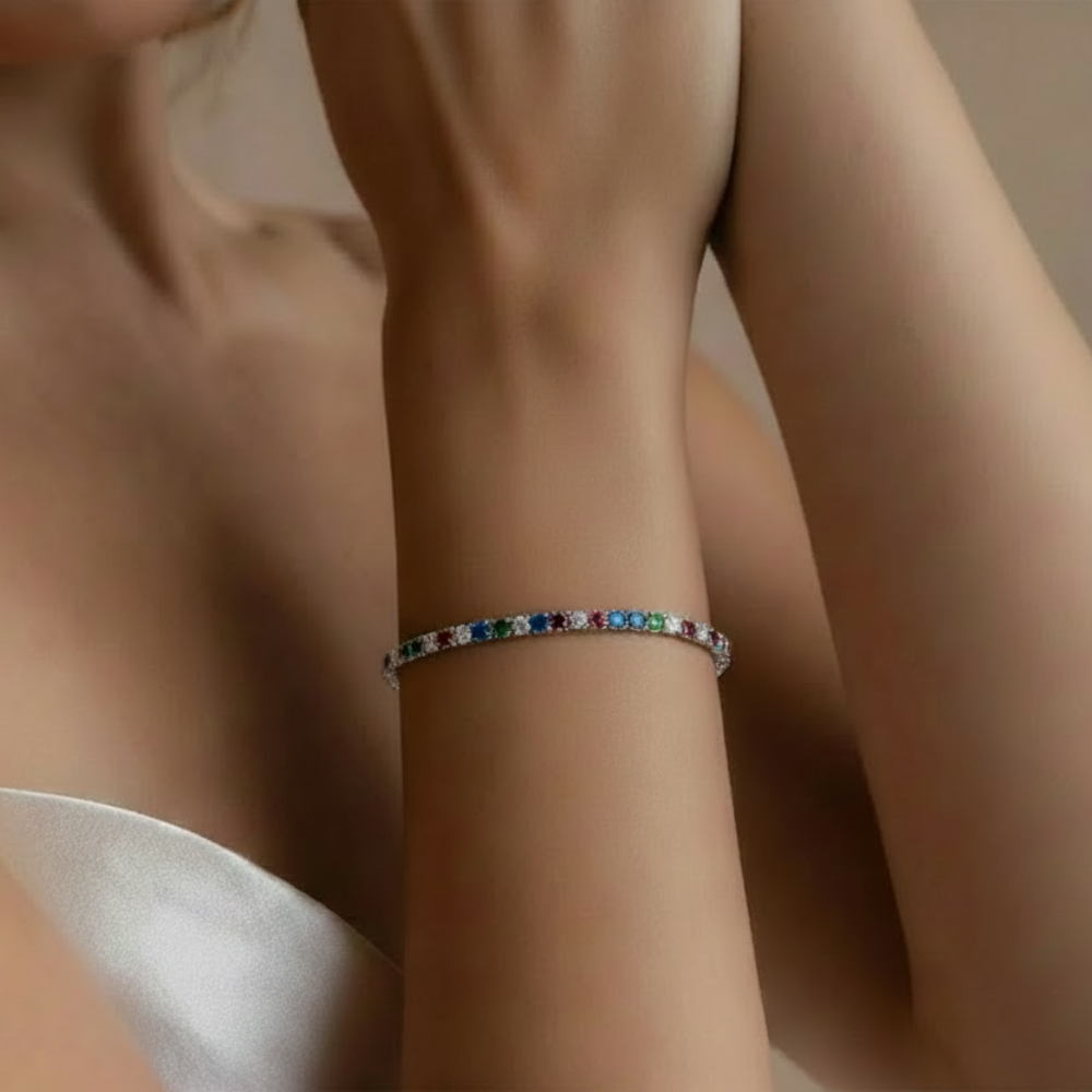 Colorful tennis bracelet on woman's wrist